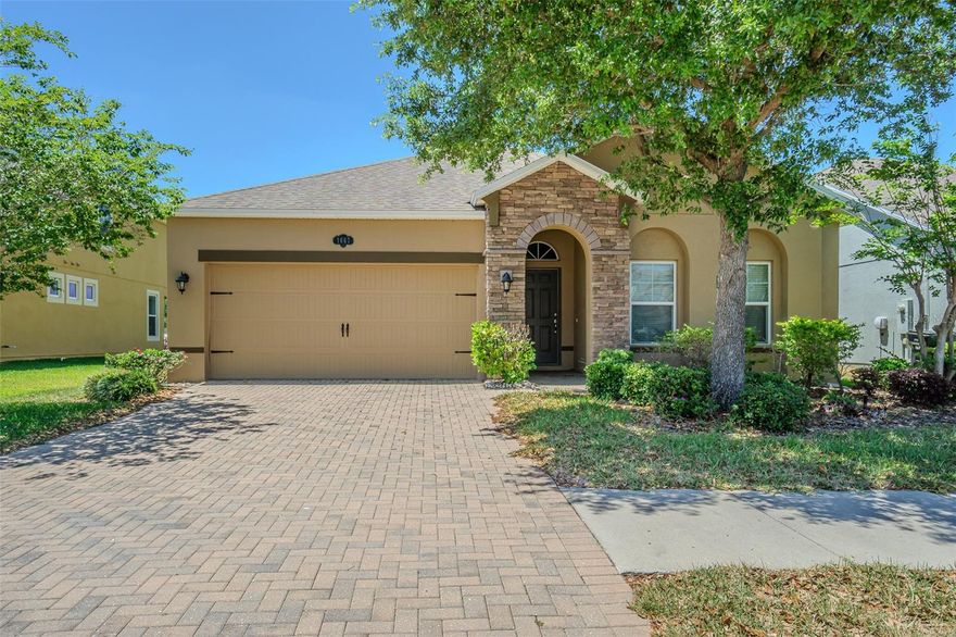 Located in the desirable Long Lake Ranch community, this home features a custom paver driveway, walkway, and a covered front porch. Inside, the open floor plan offers a formal living and dining room combination highlighted by tall ceilings, upgraded lighting, and wide baseboards. A major update to this home is the Luxury Vinyl Plank (LVP) flooring installed seamlessly throughout every room.

The kitchen is equipped with 42-inch  cabinetry, granite countertops, stainless steel appliances, a large center island with a breakfast bar, a built-in desk nook, and a casual dining area. The spacious main living room opens through sliding glass doors to lanai.

The primary bedroom features large walk-in closets and an en-suite bathroom with granite vanities  The guest bedrooms are well-sized and share the upgraded LVP flooring. Additional features include an indoor laundry room, double-pane windows.

Long Lake Ranch amenities include a community lake and dock, walking trails, a clubhouse with a pool and splash pad, tennis courts, basketball courts, and a playground.