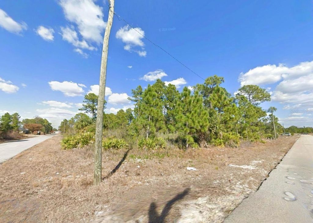 Photo of 2515 43rd Street W, Lehigh Acres, FL 33971 (MLS # TB8502020)