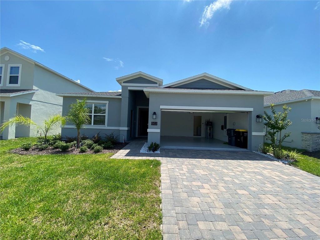 Photo of 502 Brunswick Drive, Davenport, FL 33837 (MLS # O6376909)