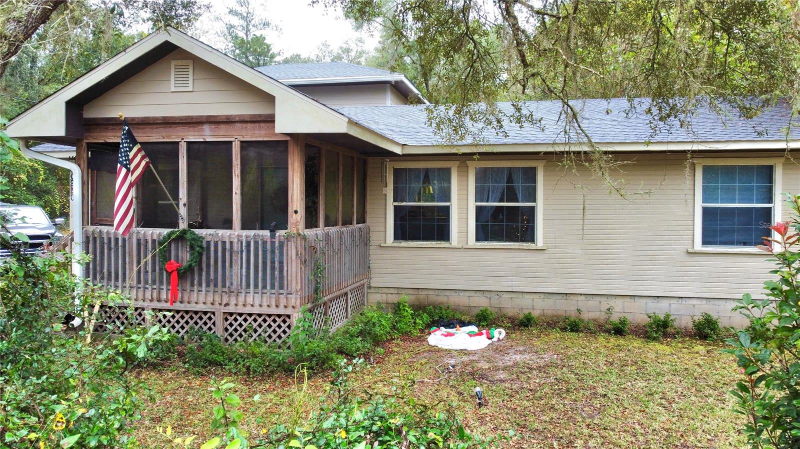 Peace & natural escape await! Situated within the town of Ft. McCoy, you are at the doorstep of the Ocala National Forest, giving way to numerous lakes, rivers, trails and natural springs. This split 3/2 home offers a large living space, overlooking kitchen area, making it ideal for hosting and socializing. The master bath has just about been remodeled, allowing you to put your final touches on it. The same can be said about the two-story addition, which is a 2 bed/1 bath with a separate entrance. Perfect for guests, in-laws or other extended family. Out back you'll find a complete RV hookup and outside shower space. An additional .22 acre parcel allows you to consider rental or AirBnB options providing you with extra, passive income. Short commute to both Ocala AND the greater Gainesville area, live close without the hefty city expense. Come see today!