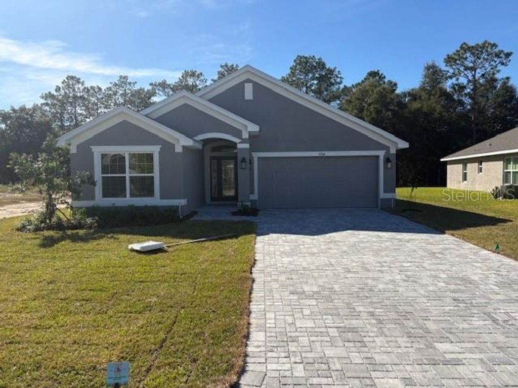 Photo of 7758 SW 180th Circle, Dunnellon, FL 34432 (MLS # OM713414)