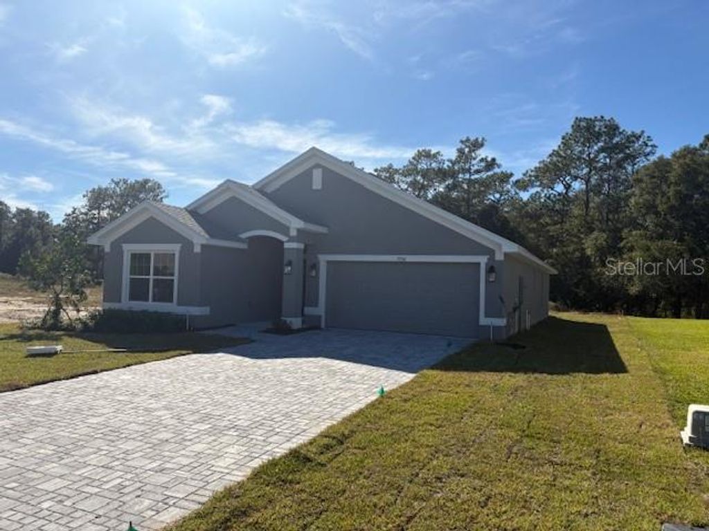 Photo of 7758 SW 180th Circle, Dunnellon, FL 34432 (MLS # OM713414)