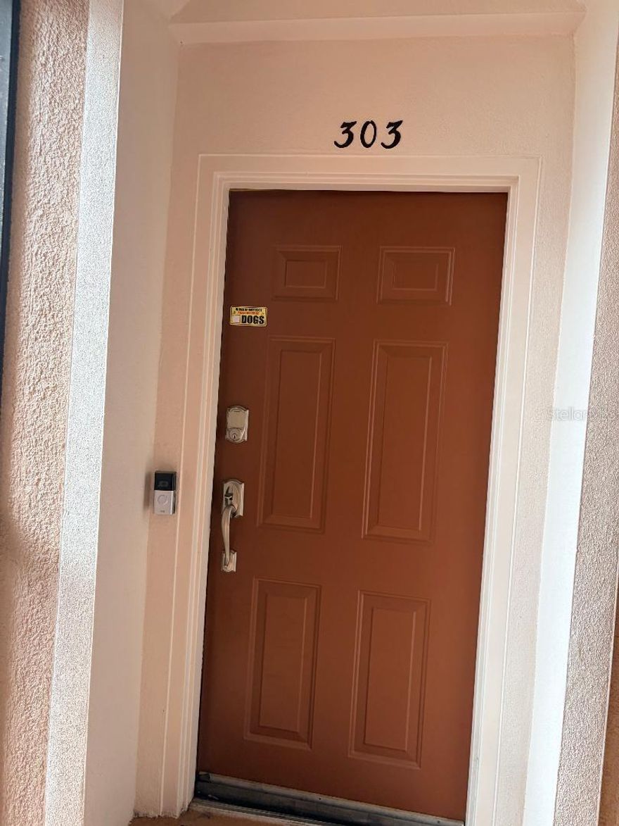 Welcome to resort-style living in the highly sought-after gated community of Bella Trae in Davenport, Florida! This beautifully maintained and brightly lit 3-bedroom, 2-bathroom condo is loaded with thoughtful upgrades and modern conveniences, making it truly move-in ready.

Step inside to discover an inviting open floor plan enhanced by new windows throughout (lifetime warranty), elegant plantation shutters, and new ceiling fans that add both comfort and style. The updated kitchen features brand-new appliances, perfect for entertaining or everyday living. Additional upgrades include a tankless water heater for endless hot water and a versatile Murphy bed, offering flexibility for guests or a home office setup.

Unwind on your private back patio overlooking a serene water view, where you can relax with your morning coffee or enjoy evening sunsets — and even catch fireworks from the Omni Hotel.

Living in Bella Trae means enjoying exceptional amenities and incredible value. The HOA covers water, pest control, basic cable, and internet, simplifying your monthly expenses. This unit also includes a covered parking space with a private storage unit for added convenience.

Residents have access to a lifestyle director, community pool/spa, dual pickleball and tennis courts, and a beautifully appointed clubhouse featuring a state-of-the-art fitness center, pool table, and an outdoor summer kitchen complete with grills and a cozy fire pit — perfect for gatherings with friends and family. Walk to all the new restaurants and coffee shops on Championsgate Blvd

Don’t miss your opportunity to own this upgraded, low-maintenance condo in one of the area’s most desirable communities. Schedule your p showing today!