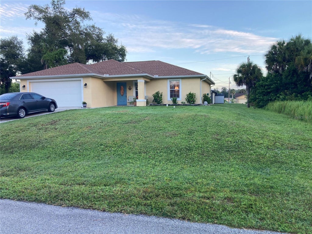 Photo of 14456 Cobb Avenue, Port Charlotte, FL 33953 (MLS # C7531362)