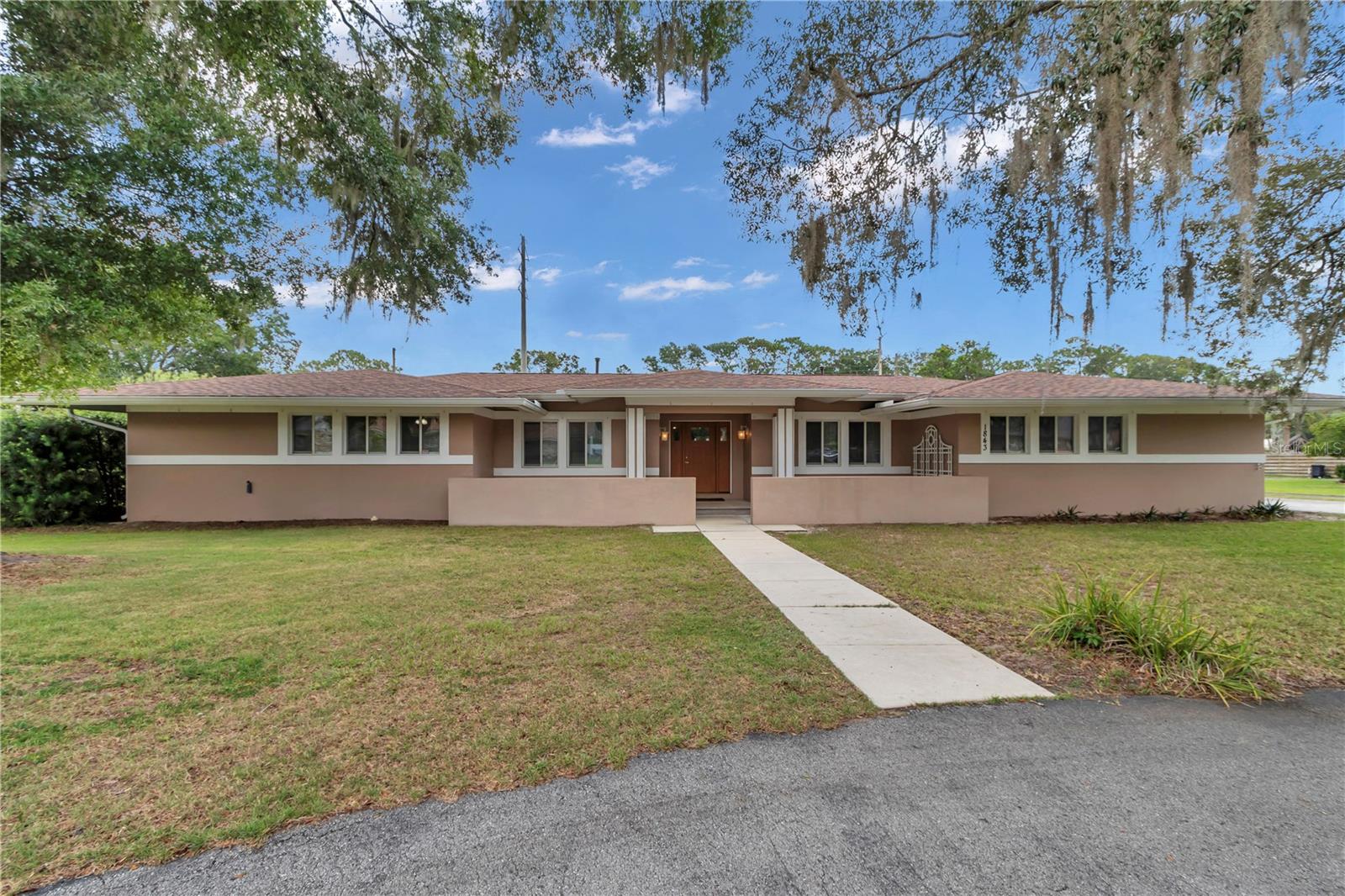Welcome to this 2001 built, move-in ready & impeccably maintained 3-bedroom, 4.5-bath quality, custom-built home, boasting 2,748 square feet of living space. Each bedroom has it's own attached ensuite bathroom. Plus there is a half bath as well! This home features a chef's kitchen with a gas cooktop, built-in convection oven, quality cabinetry and a breakfast area too. The family room has a beautiful gas fireplace that leads out to a large Florida room overlooking the spacious backyard. The large master bedroom has a huge walk-in closet and two en-suite bathrooms! This home has 2 flex spaces that could be used as a living room, den, library, dining room or office. There is an additional office with built in shelving. You will appreciate the large indoor laundry room with lots of cabinets for additional storage. The washer and dryer are included!
Set on over three-quarters of an acre, the property offers plenty of privacy with no backyard neighbors and mature landscaping. There is a 3 car attached garage in additon there is a workshop/tool room area. The freezer is included.
The large circular driveway in the front adds curb appeal and allows for plenty of parking. Bring your boat, RV and more as this home has a 30x30 detached garage with an 18x30 storage loft provides ample space for vehicles, toys and hobbies.
The roof was replaced in 2025, water heater 2024, HVAC 2016 ensuring peace of mind for years to come. The home underwent an extensive remodel in 2016. A well is available for irrigation if desired.
Located in a quiet, established neighborhood with no HOA, this home is a true gem! Don't wait....book your tour today!