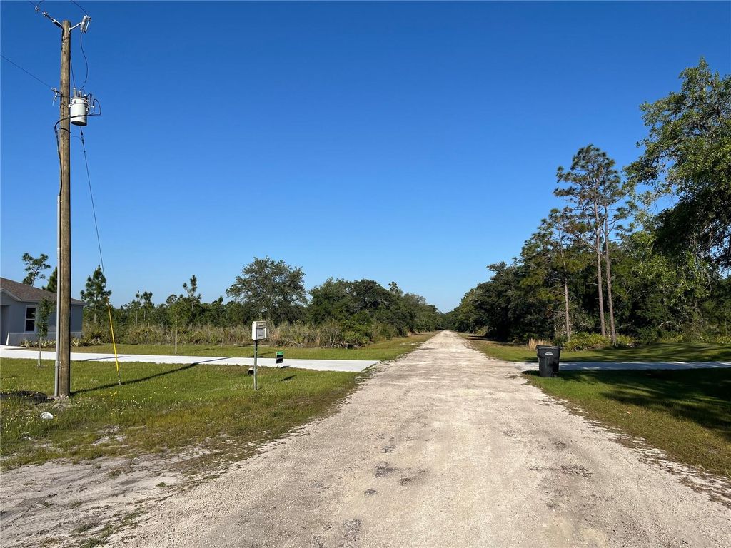 Photo of 1019 Calendula Drive, Indian Lake Estates, FL 33855 (MLS # OK225166)