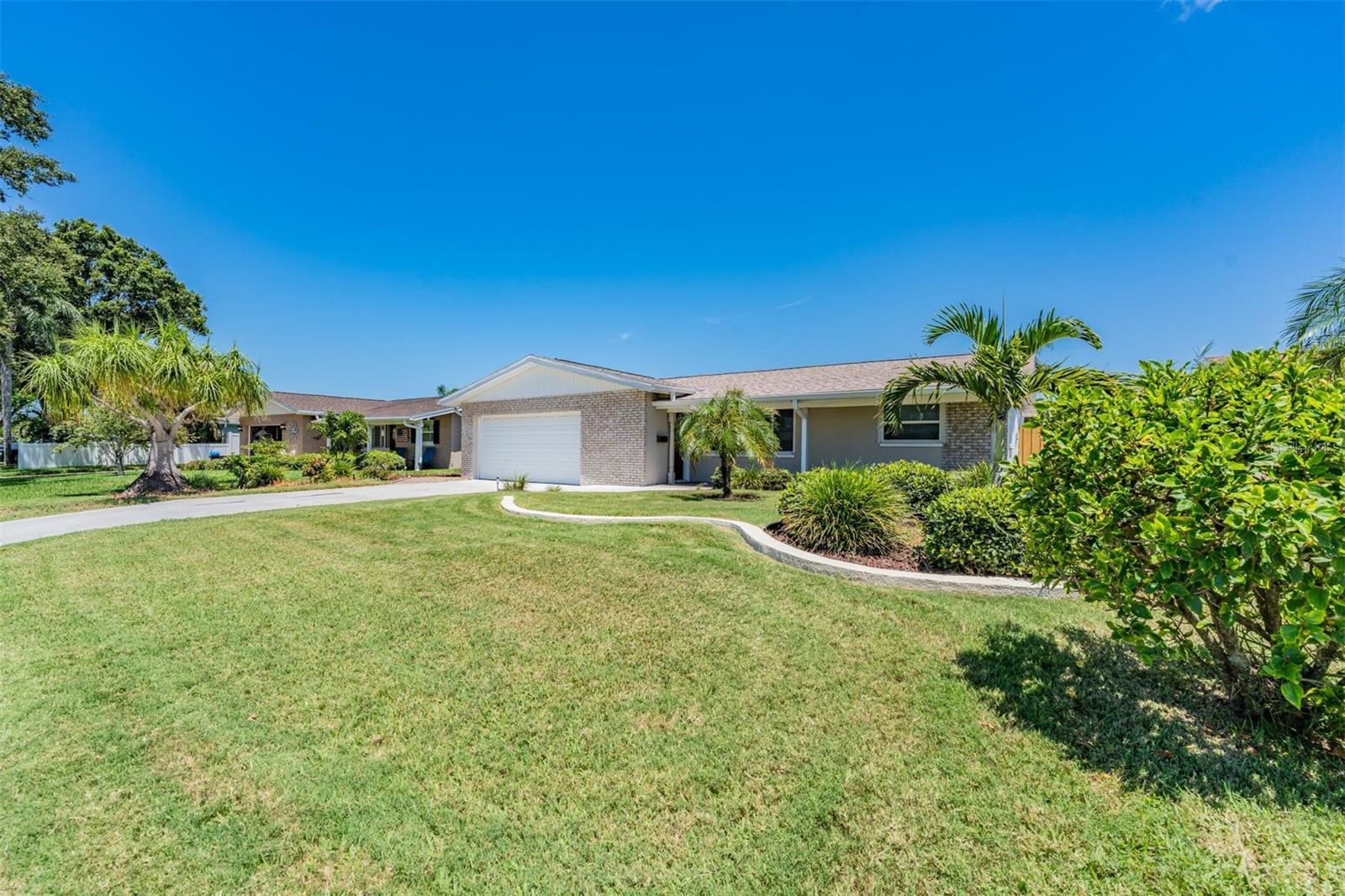 Welcome to 13483 87th Ave in Seminole, a thoughtfully updated pool home that blends timeless comfort with modern day function. Tucked into a quiet residential street in the heart of Pinellas County, this charming 2 bedroom, 2 bathroom block construction home invites you to move right in and start living the Florida lifestyle.
As you pull into the brand-new driveway (2024), you'll immediately notice the pride of ownership that carries throughout the property. Step inside and you're greeted by fresh 2023 updates including wide plank floors and recessed can lighting that brighten every room and create a clean, modern feel. The open concept layout connects the living area seamlessly to the dining room and renovated kitchen, making this space perfect for entertaining or relaxing at home. The kitchen, remodeled in 2013, features timeless finishes and updated appliances including a double refrigerator that make meal prep both easy and enjoyable.
The home’s comfort extends to the private spaces as well. The primary suite is a peaceful retreat, complete with a fully renovated en-suite bathroom finished in 2022, showcasing stylish tile work and modern fixtures. A newer AC unit from 2015 ensures the home stays cool year round, while a brand new roof installed in March 2023 provides peace of mind for years to come.
But the true showstopper lies just outside. The backyard is a personal oasis featuring an in-ground, chlorinated pool added in 2000, perfect for a refreshing dip on sunny afternoons. The pool has been updated with a brand-new pump (2024) to ensure smooth operation and minimal upkeep. Whether you're hosting a summer BBQ or enjoying a quiet evening under the stars, this space was made for Florida living.
Located just minutes from Gulf beaches, parks, and top-rated schools, this home offers the ideal mix of lifestyle and location. From its solid block construction to its long list of recent upgrades including roof, flooring, lighting, bathroom, and pool systems, 13483 87th Ave stands out as a smart, move-in ready opportunity in one of Seminole’s most desirable pockets.