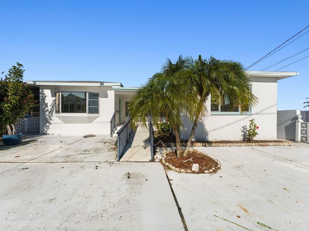 Photo of 244 145th Avenue E, Madeira Beach, FL 33708 (MLS # TB8461078)