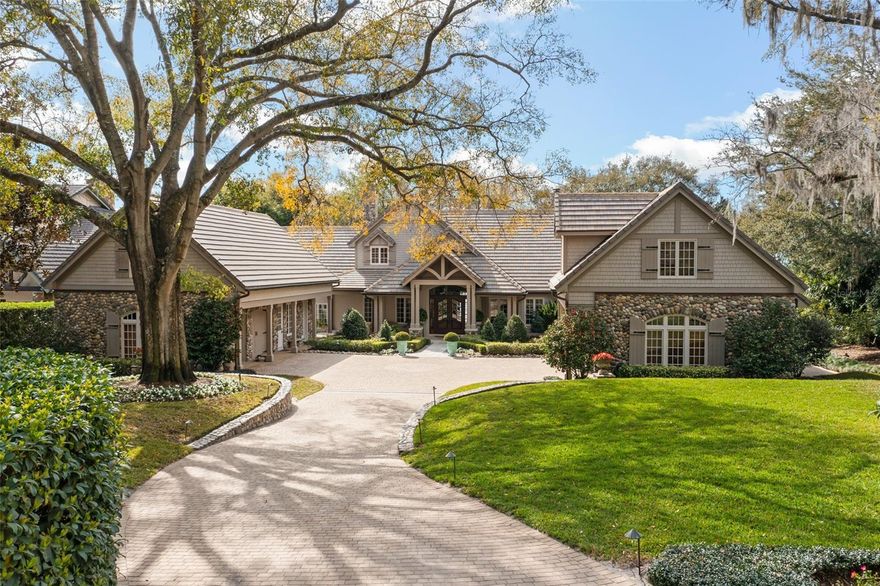 Rare, coveted, and simply extraordinary. Majestic in every way, this Butler Chain of Lakes oasis boasts over one acre of landscaped beauty, exquisite design, extreme privacy, and is now being offered for the very first time.  Nestled on a serene street in historic downtown Windermere moments from the vibrant hub of charming boutiques and eateries, this remarkable property will simply take your breath away.  Enjoy western exposure sunsets with Lake Butler and Bird Island vistas from the comfort of your waterfront estate.  The property features a grandfathered boathouse with sought after screen room complete with bar and entertaining space, covered boat slip with electric door, mooring whips for additional boat docking, and 2 jet ski lifts.  Delight in the pristine white sand beach and the crystalline waters along 150 feet of lake frontage.  Situated on meticulously mature landscaped grounds, the backyard oasis offers a delightful cabana with gas grill, open patio seating, adjacent oversized screened porch, all with ample space leftover for a future pool.  Step into the grand foyer, where beautiful tongue and groove barreled ceiling and exquisite millwork set the tone, flanked by the warm and inviting formal living and dining rooms. Revel in the warmth of two wood-burning fireplaces, one gracing the formal living room and the other a stunning two story river rock fireplace framed by custom hewn timber trusses in the soaring family room. The dining room, complete with vaulted tongue and groove ceiling, transitions seamlessly to a butler's pantry, generous walk-in pantry, and chef inspired gourmet kitchen with an eat-in area boasting panoramic lake views. Convenience abounds with a side entry leading to a spacious laundry room, built-in desk area, powder bath, and a bonus room over the main garage. The opposite wing of the residence encompasses a handsome study with built-ins, adjacent wine cellar and two bedroom ensuites, both with oversized closets. Ascend to the overly generous upstairs owner’s suite, where your private balcony overlooks the lake and terraced backyard. Complimenting the expansive custom walk-in closets, lies a sumptuous bath featuring a soaking tub, separate oversized shower, and dual vanities that complete the second floor.  Enhancing the estate's allure are two detached two-car garages, one connected to the main residence by a covered walkway, while the second features a first floor detached guest suite with a full bath and kitchenette. Above, two expansive flex spaces provide utmost versatility, currently utilized as a gym and additional guest sleeping quarters. The property's curb appeal is unmatched, thanks to lush, manicured landscaping framing the entrance, with exquisite river rock garden walls, and paver walkways. Thoughtfully designed for optimal storage and adorned with meticulous custom finishes, this property offers the epitome of luxury lakefront living with no HOA restrictions. Bedroom Closet Type: Walk-in Closet (Primary Bedroom).