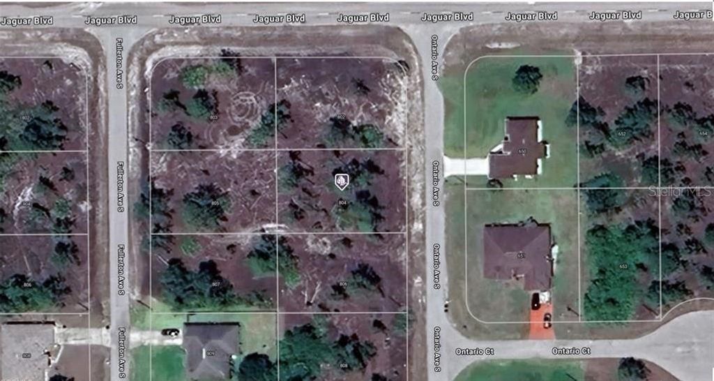 Photo of 804 Ontario Avenue S, Lehigh Acres, FL 33974 (MLS # A4671817)