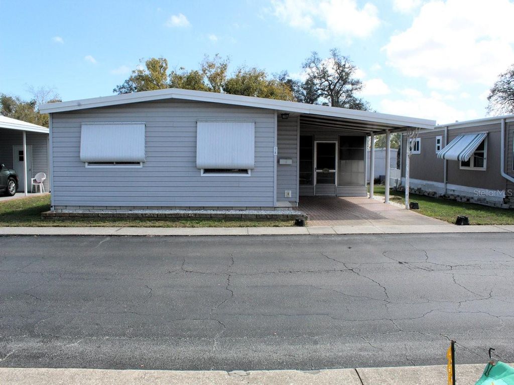 Photo of 2 Pindo Palm Street E, Largo, FL 33770 (MLS # TB8484670)