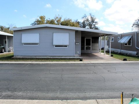 Photo of 2 Pindo Palm Street E, Largo, FL 33770 (MLS # TB8484670)