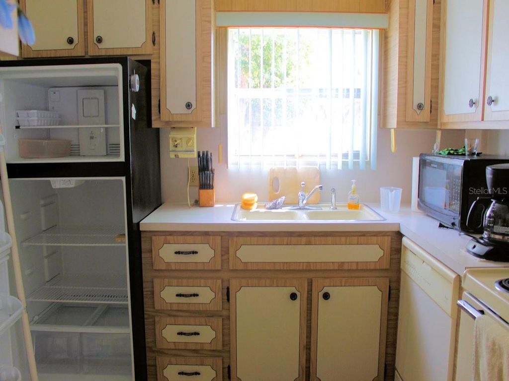 Photo of 2 Pindo Palm Street E, Largo, FL 33770 (MLS # TB8484670)