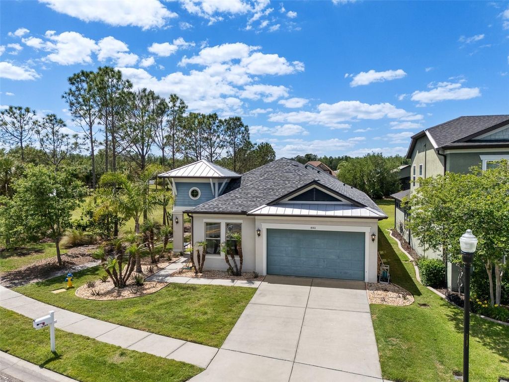 Photo of 4501 Rolling Green Drive, Wesley Chapel, FL 33543 (MLS # TB8495928)