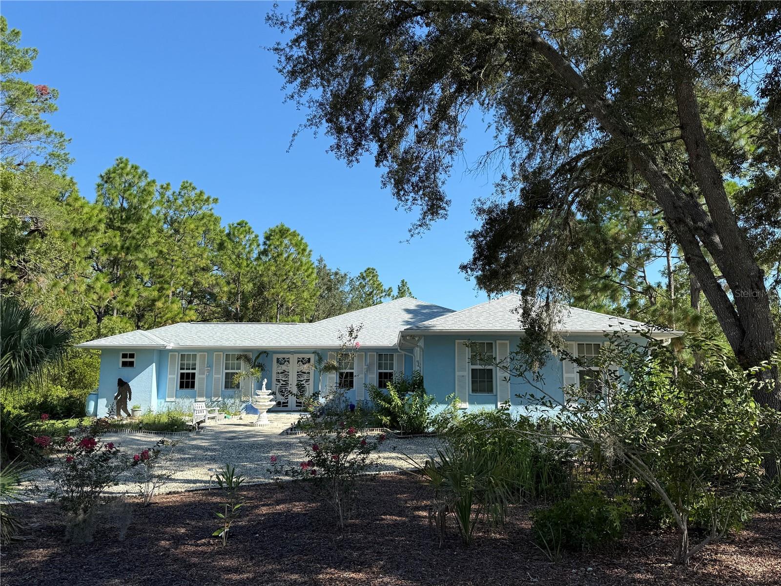 One-of-a-kind courtyard home built to withstand a category 5 hurricane!
Built with steel reinforced solid concrete walls rated to 235 mph winds, Miami- Dade Certified Hurricane Impact windows, Accordion shutters on all 13 French doors, and a new W-8 rated double garage door. Due to its hurricane hardiness the home qualifies for the maximum deduction on your Homeowner's insurance. This 6 bedroom, 4 bath home in Pine Ridge Estates has a very unique floor plan for a multi-generational family. It features a large gourmet kitchen with lots of counter space, 2 islands, a 39 cubic Refrigerator/Freezer, a convection oven, a microwave/convection oven, a dishwasher and pantry. In addition, there is a formal living room, dining room, family room, and a breakfast cafe. This home is handicap accessible with wide doorways, hallway, and a step-free shower. The roof was replaced in January '25 and has a secondary barrier. In addition to the insulated walls, this home includes a radiant heat barrier, 18 SEER Trane A/C (1 1/2-ton and 5-ton units), all high efficiency appliances and dual-flush toilets. This home's foundation is protected by a Belgard retaining wall system that features a 9-foot-wide stairway to the garden below with ornamental planters on top of the columns. This home is a must see!