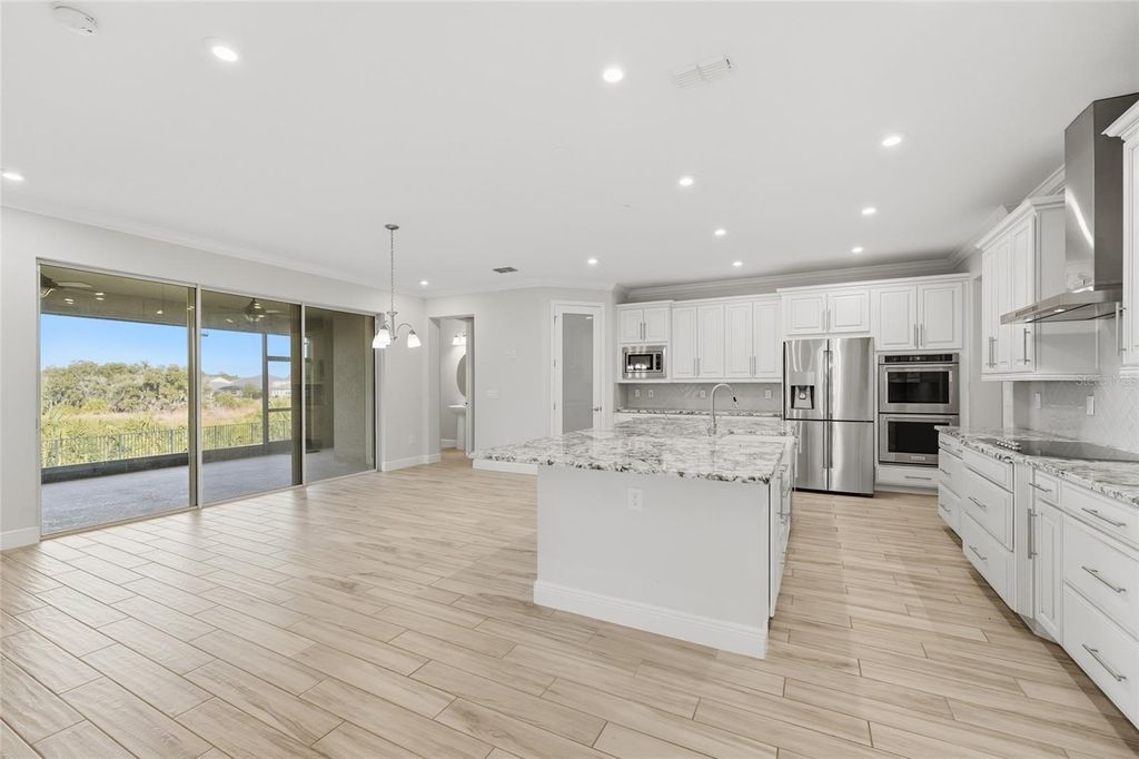 Photo of 17060 Wingspread Loop, Winter Garden, FL 34787 (MLS # O6379390)