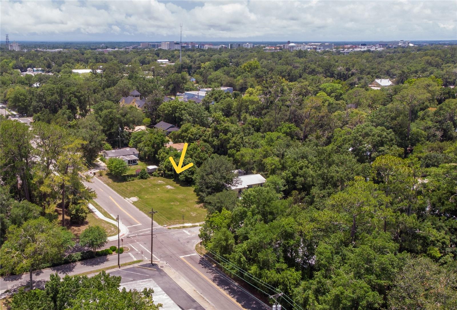 Seize this prime investment opportunity in the desirable Grove Street neighborhood. This vacant lot measures approximately 54 feet wide (fronting 14th Ave) by 140 feet long (along Pleasant St), offering ample space for development. The updated zoning allows for a primary residence with an 850 square foot attached unit, plus an additional detached unit—providing various rental opportunities or the option to create a generational living compound. You might also consider a potential lot split to further maximize utility and value. With new sewer and water connections already in place along 14th Ave, the lot is almost construction-ready. This location is ideal for attracting tenants or establishing a versatile multi-member living environment. It's conveniently near the University of Florida, popular dining spots, retail outlets, and the lively Monday farmer's market at Cypress and Grove. Residents will enjoy nearby bike trails and public parks, while the proximity to Depot Park, the Hippodrome, and downtown Gainesville’s cultural attractions adds further appeal. This ready-to-develop parcel is perfect for developers or investors seeking strong rental income or those looking to create a flexible living arrangement in a vibrant and growing community. Buyers and their agents are advised to conduct their own due diligence and verify all information to their own satisfaction and requirements.