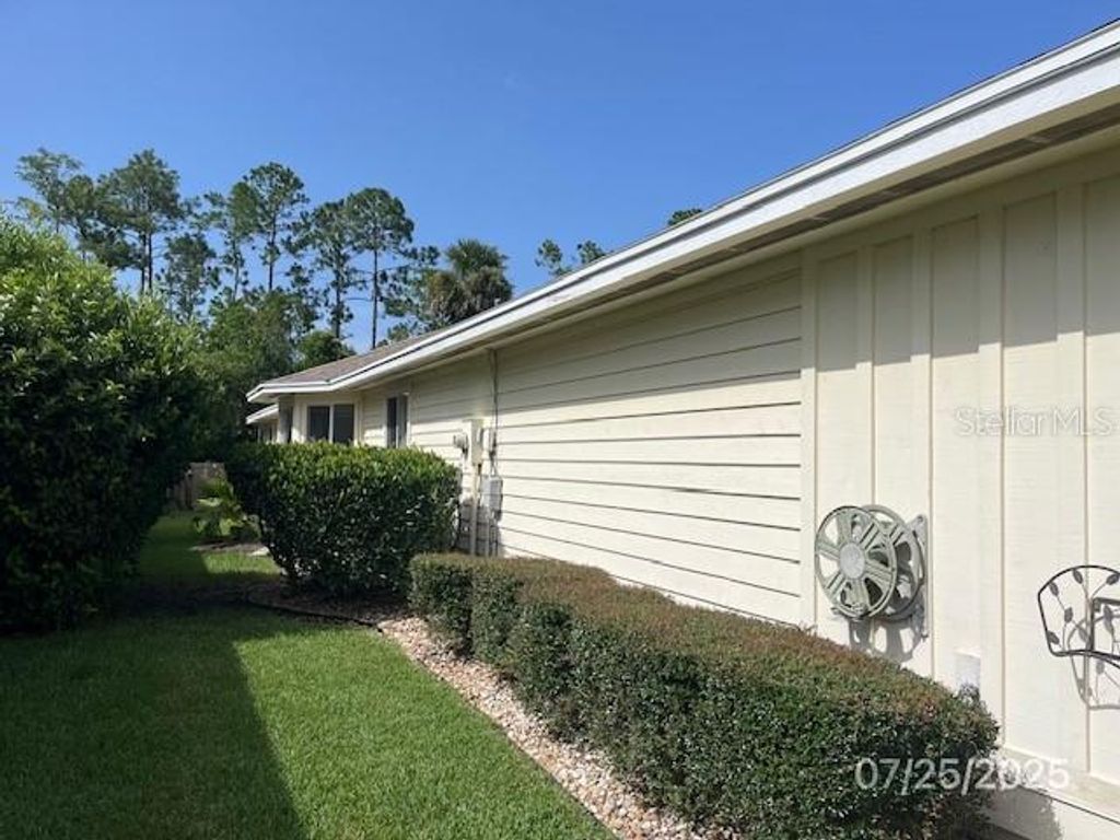 Photo of 18 Treetop Circle, Ormond Beach, FL 32174 (MLS # V4944339)