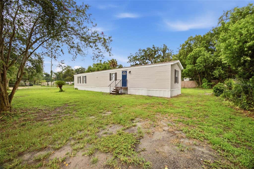 Photo of 11602 Lewis Avenue, Thonotosassa, FL 33592 (MLS # TB8535360)