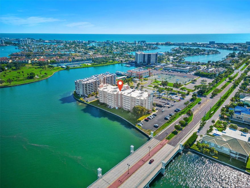 WATERFRONT CONDO – AVAILABLE NOW ~~ FURNISHED
Live the waterfront lifestyle in this beautifully designed 2 bed, 2 bath condo overlooking Boca Ciega Bay. Enjoy stunning sunrises and panoramic views of the Intracoastal Waterway and Causeway Bridge from your private, oversized balcony.
This updated unit features high-end finishes throughout, including sleek concrete countertops in the kitchen and baths, Jenn Air appliances, ambient lighting, and a spacious open floor plan with an additional sitting area and built-in bar. Both bedrooms have an ensuite bath and generous closet space. An INDOOR LAUNDRY room adds convenience.
Additional features include an assigned parking space and a private storage room. Located just 1 mile from the beach and minutes to shopping, dining, and downtown St. Pete.