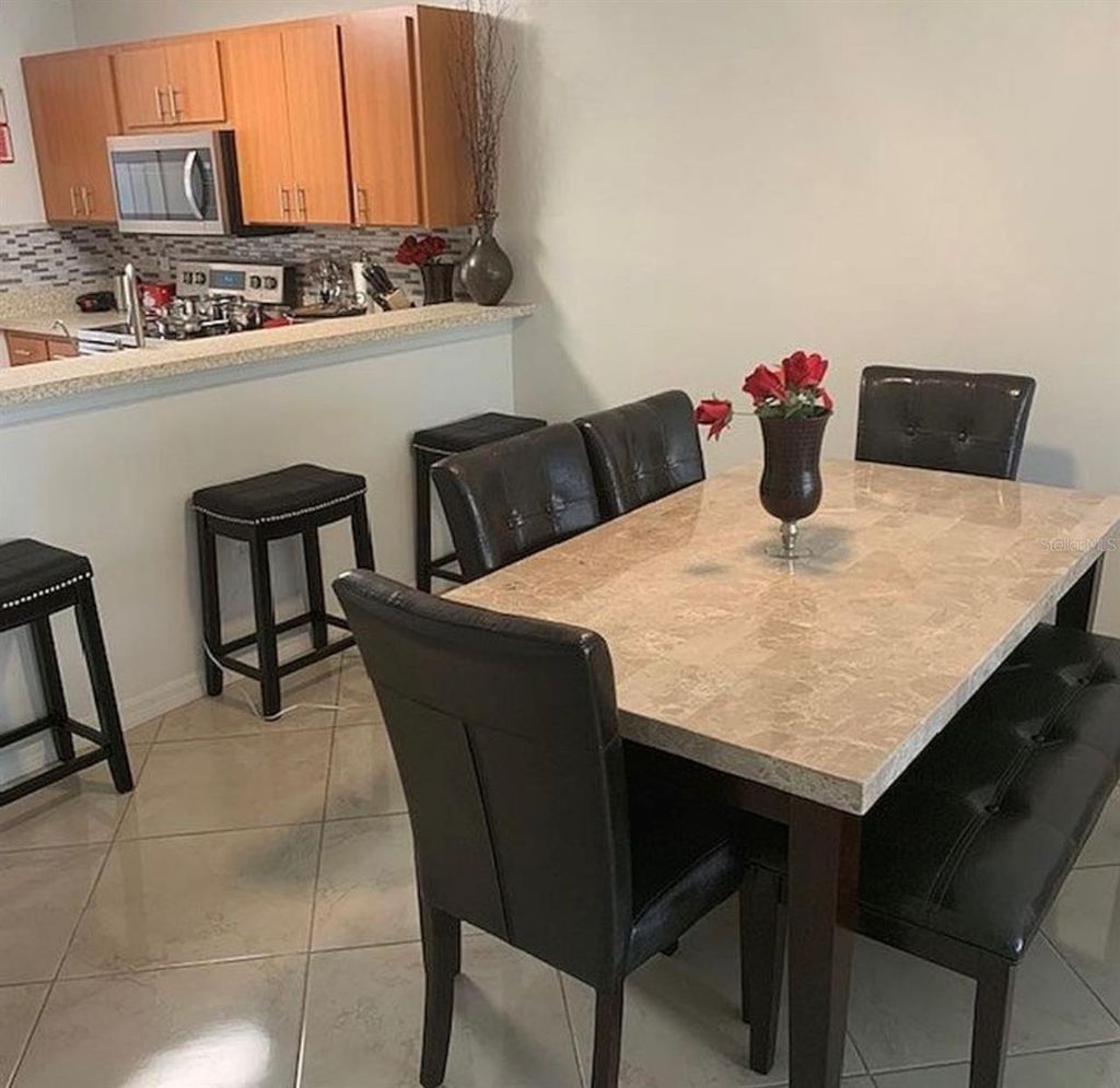 Photo of 2208 Mystic Ring Loop, Kissimmee, FL 34759 (MLS # TB8442172)