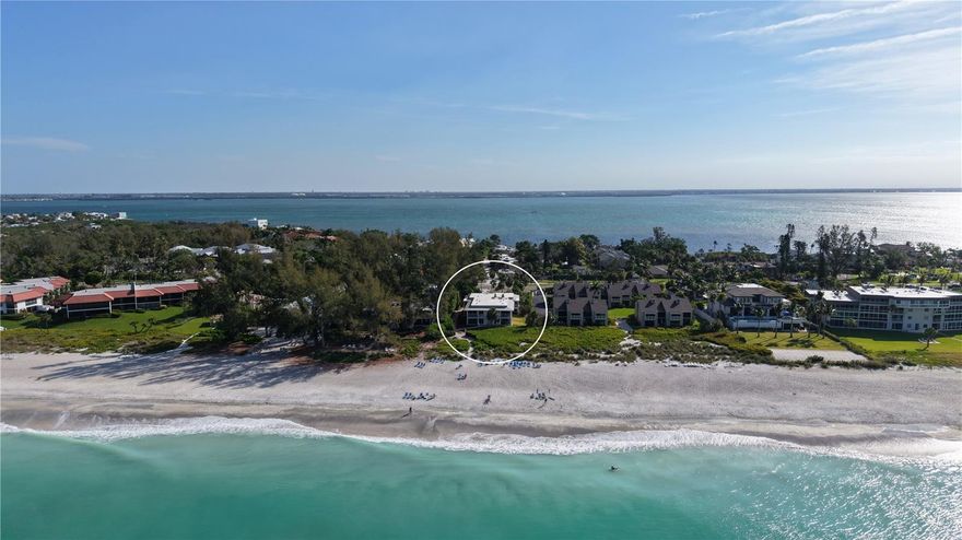 Turnkey furnished and positioned just steps from the Gulf’s sandy shoreline, this first-floor residence at Beach Castle on Longboat Key offers a compelling combination of coastal living and proven rental potential. With flexible daily or weekly rental allowances, this two-bedroom retreat presents an exceptional opportunity for personal use, income generation, or both. 
The light-filled interior features an open layout designed for ease and comfort, where the kitchen, dining, and living areas flow together naturally. Oversized tile flooring, updated impact glass, and sliding doors enhance both durability and livability, while the kitchen is well-appointed with granite countertops, solid wood cabinetry, stainless steel appliances, and built-in shelving—creating a functional space for everyday living or hosting. 
Floor-to-ceiling sliders lead to a private patio and screened lanai, offering a seamless transition to the outdoors and placing you just moments from the beach. The split-bedroom plan provides added privacy, with the primary suite enjoying direct access to the outdoor space, while the guest bedroom is comfortably sized with its own en-suite bath.
Set within the boutique Beach Castle community, residents enjoy a unique beach-to-bay lifestyle with deeded Gulf access, a heated swimming pool and spa, grilling areas, and a fishing pier with day dock on Sarasota Bay. Lush landscaping and well-maintained grounds create a relaxed, resort-style setting that enhances both owner enjoyment and guest appeal. 
Located on the desirable north end of Longboat Key, this property is just minutes from Bayfront Park, Cedars Tennis Resort, and the island’s scenic biking and walking paths. A short drive south brings you to the Longboat Key Club, St. Armands Circle’s dining and boutiques, and downtown Sarasota’s renowned cultural venues, waterfront parks, and year-round events.
With strong rental history, immediate beach access, and a turnkey presentation, this Beach Castle residence offers a rare opportunity to enjoy the best of Longboat Key—whether as an investment, a private getaway, or a combination of both.