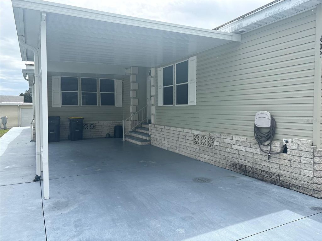 Photo of 409 Dreama Drive, Davenport, FL 33897 (MLS # TB8432218)