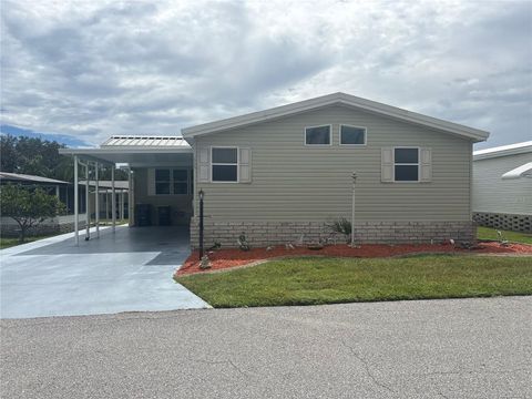 Photo of 409 Dreama Drive, Davenport, FL 33897 (MLS # TB8432218)