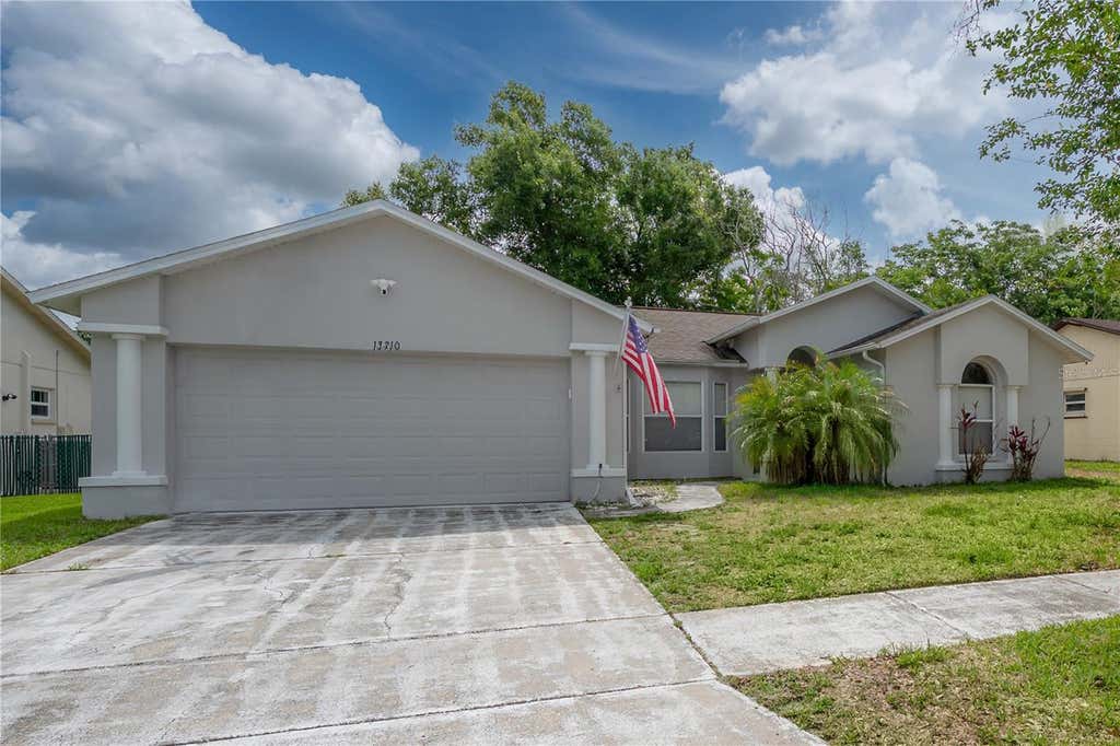 Photo of 13210 Whaler Drive, Hudson, FL 34667 (MLS # TB8514884)