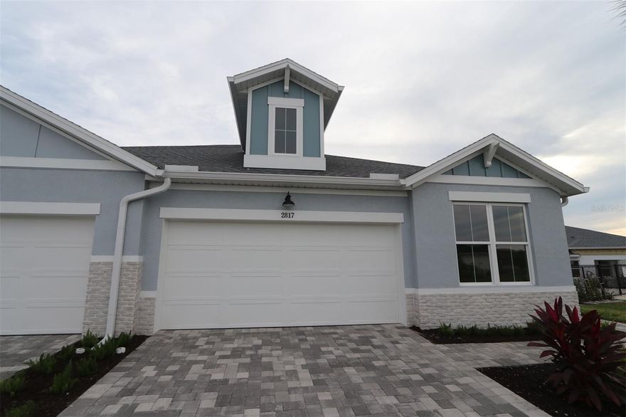 Under Construction. Welcome to The Fieldview by David Weekley Homes — a luxury villa in the gated community of Gracewater, where timeless design meets serene preserve views and natural light fills every corner. More than just a stunning home, The Fieldview is thoughtfully crafted for the rhythms of real life — full of connection, comfort, and meaningful moments.
Begin each day in the expansive Owner’s Retreat — your private sanctuary featuring a spa-inspired bath and a generously sized walk-in closet designed for both style and function. It’s the perfect space to recharge, reflect, and relax.
Inside, natural light pours through a wall of glass — oversized sliders that create a seamless connection between the indoors and the outdoors. This open-concept layout flows from the spacious dining and family rooms to the large screened-in lanai overlooking tranquil preserve views — perfect for morning coffee, evening gatherings, or simply unwinding with nature.
With three full bedrooms, The Fieldview offers flexibility for guests, hobbies, or simply spreading out in comfort. And with full impact windows throughout, you’ll enjoy peace of mind along with energy efficiency and year-round protection.
At the heart of it all, the elegant kitchen is a hub for connection — where meals are shared, traditions begin, and everyday moments become lasting memories. **When you purchase a select David Weekley Quick Move-in Home in the Tampa, Manatee and Sarasota area from September 1 – December 31, 2025, qualified buyers may be eligible for a starting rate as low as 3.99% (4.271% APR) when the home purchase is financed with a conventional 7/6 adjustable rate mortgage home loan from our preferred lender.