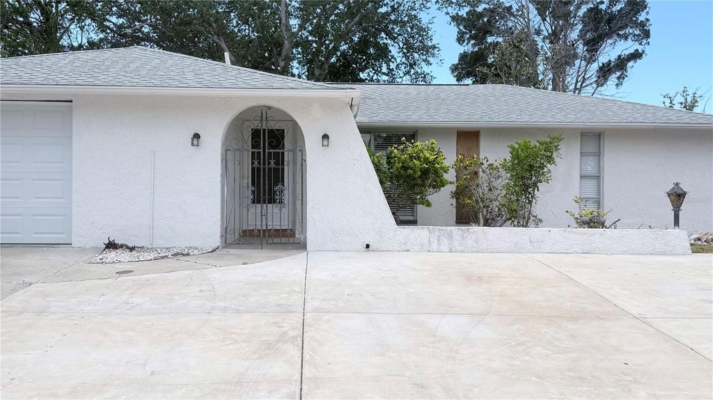 Photo of 8923 Candlewick Lane, Port Richey, FL 34668 (MLS # TB8503267)