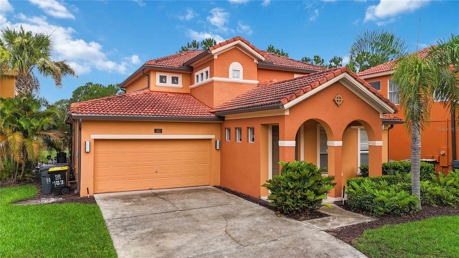 ** INCREDIBLE VALUE HOME IN WATERSONG**. What an amazing OPPORTUNITY!! Stunning LUXURY SHORT TERM RENTAL home in the gated community of Watersong in Davenport. Professionally decorated. This home has EVERYTHING needed for the perfect vacation or winter residence. There is a wonderful sociable floor plan with numerous areas for relaxation and enjoying the relaxing Florida lifestyle. Converted garage is a LARGE AIR-CONDITIONED,SUPERHERO THEMED THEATER ROOM specifically designed for enjoying the big screen and making wonderful vacation memories and also includes a pool table. The first-floor features two masters suites in addition to a well-designed kitchen, family room area and dining area. The kitchen and open plan family room enjoy great views of the pool and green space to the rear. The second-floor features one master suite and two bedrooms with a Jack and Jill bathroom. 65" TVs in each master bedroom.76" ROKU TV in the gameroom.The HEATED pool with a built-in spa has wonderful views of the trees and greenspace to the rear of the home  NO REAR NEIGHBORS for privacy and convenience. This is the perfect home to make vacation memories with the potential for investment income! The Watersong community HOA includes many amenities for discerning guests such as 24-Hour Manned GATED SECURITY Access, Professionally Managed HOA, Cable & WIFI, Private 7,600 sq' Clubhouse & Amenity Center, Zero Entry Resort-style Pool, Fitness Center, Sand Volleyball Court and playground. This community is tree lined and peaceful resort retreat located a short drive from Disney and Orlando’s top attractions. Only 90 minutes from the beach and within easy reach of National parks, Lakes and all that central Florida has to offer. Dining, shopping and a multiplex movie theatre are all nearby at Posner Park and ChampionsGate. Reunion, Providence & ChampisonGate are close by for golf enthusiasts and there is an awesome Day Spa at the nearby Omni resort for some pampering! Call today for more information and to schedule your showing!