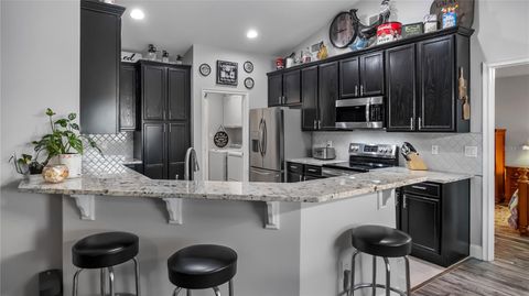 Tiny photo for 406 S Palm Avenue, Howey In The Hills, FL 34737 (MLS # O6416440)
