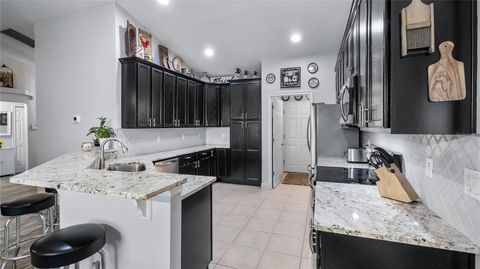 Tiny photo for 406 S Palm Avenue, Howey In The Hills, FL 34737 (MLS # O6416440)