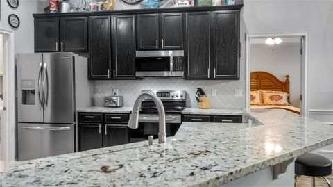 Tiny photo for 406 S Palm Avenue, Howey In The Hills, FL 34737 (MLS # O6416440)