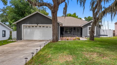 Photo of 406 S Palm Avenue, Howey In The Hills, FL 34737 (MLS # O6416440)