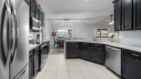 Tiny photo for 406 S Palm Avenue, Howey In The Hills, FL 34737 (MLS # O6416440)