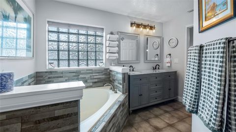Tiny photo for 406 S Palm Avenue, Howey In The Hills, FL 34737 (MLS # O6416440)