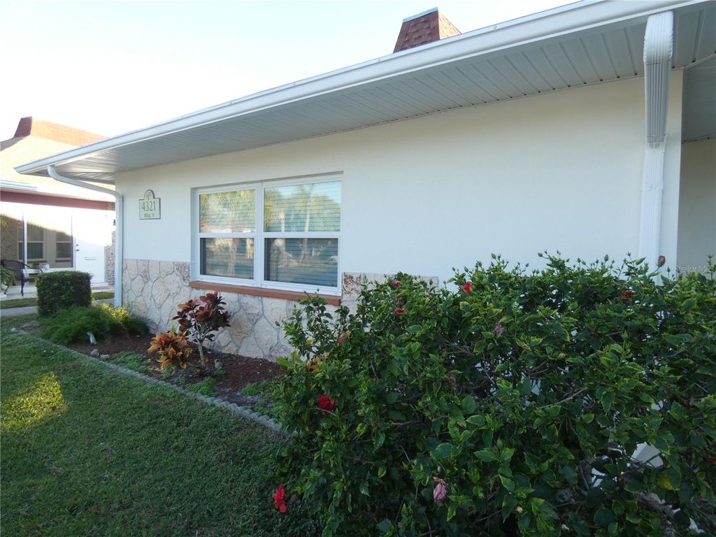 Photo of 4321 Tahitian Gardens Circle #A, Holiday, FL 34691 (MLS # W7880558)