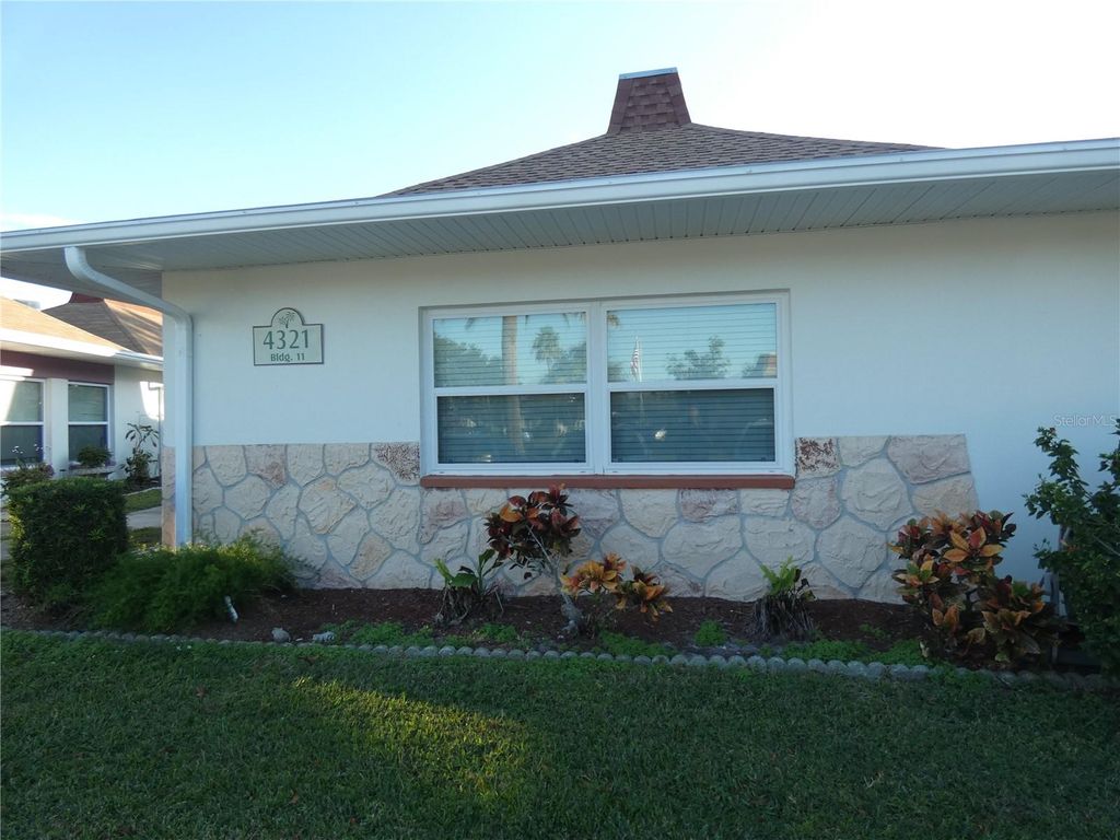 Photo of 4321 Tahitian Gardens Circle #A, Holiday, FL 34691 (MLS # W7880558)