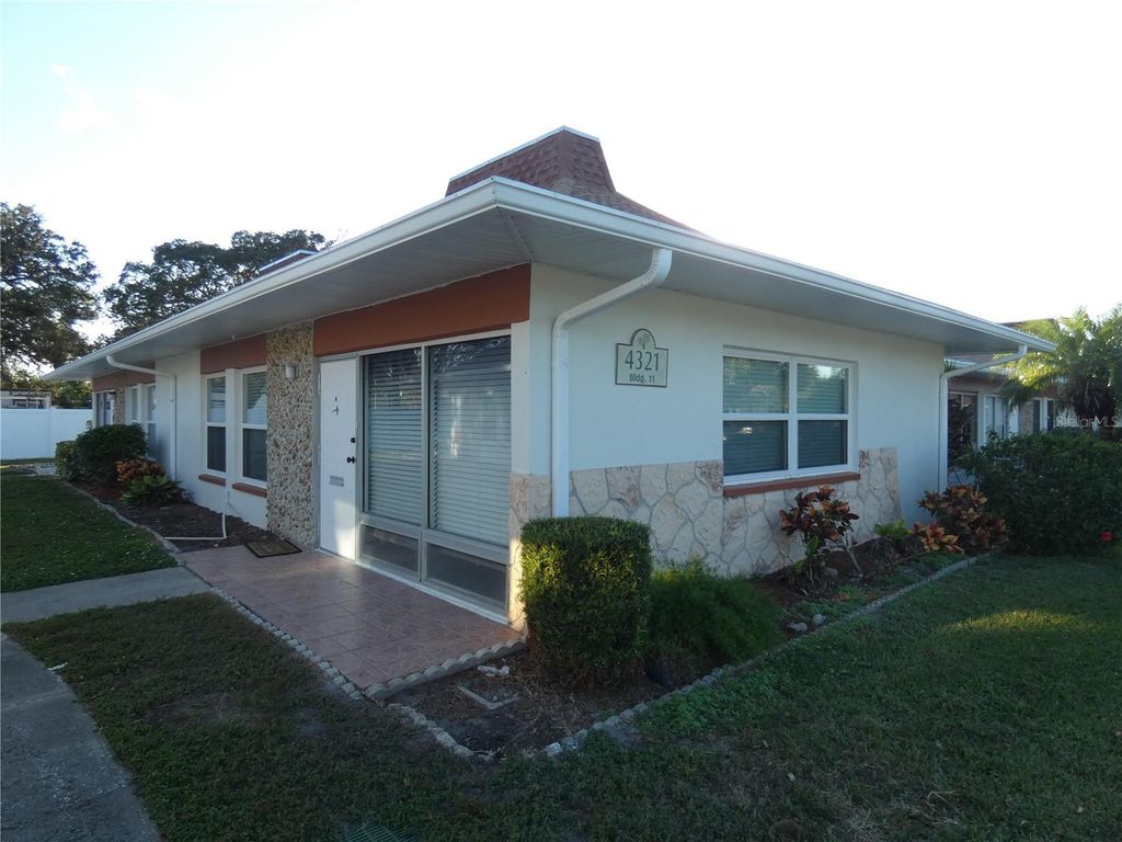 Photo of 4321 Tahitian Gardens Circle #A, Holiday, FL 34691 (MLS # W7880558)