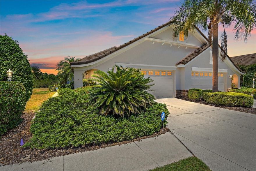 Welcome to 7011 Woodmore Terrace, currently available in the prestigious Lakewood Ranch Country Club. This beautifully maintained 2-bedroom, 2-bath villa with a den offers the perfect blend of maintenance-free living all set against a peaceful lake view. Spanning 1,565 square feet, this light-filled residence features an inviting open-concept floor plan designed for both everyday living and effortless entertaining. The kitchen has been thoughtfully updated with new granite countertops, sink, faucet, microwave, and a 2019 refrigerator, creating a stylish and functional space at the heart of the home. Recent improvements also include a new gas water heater (2025) and re-stained bathroom tile flooring, adding value and peace of mind. The spacious primary suite offers a relaxing retreat with a generously sized bedroom and an en-suite bath featuring dual vanities. A versatile flex room provides the perfect option for a home office, den, or guest space. The living and dining areas flow seamlessly, making gatherings both comfortable and welcoming. Step outside to your screened lanai overlooking the pond, an ideal spot for morning coffee, evening relaxation, or alfresco dining. The home is complemented by attractive landscaping, excellent curb appeal, and a 2-car garage. Residents of Lakewood Ranch Country Club enjoy scenic walking trails and the option to join golf, tennis, fitness, and social memberships. One of the neighborhood’s standout features is the heated pool and spa located just steps away. Conveniently located minutes from Main Street shopping and dining, top-rated schools, and the world-famous Gulf Coast beaches, this villa delivers exceptional lifestyle and value. This is a rare opportunity to own in Lakewood Ranch Country Club at the best price point available—don’t miss it.