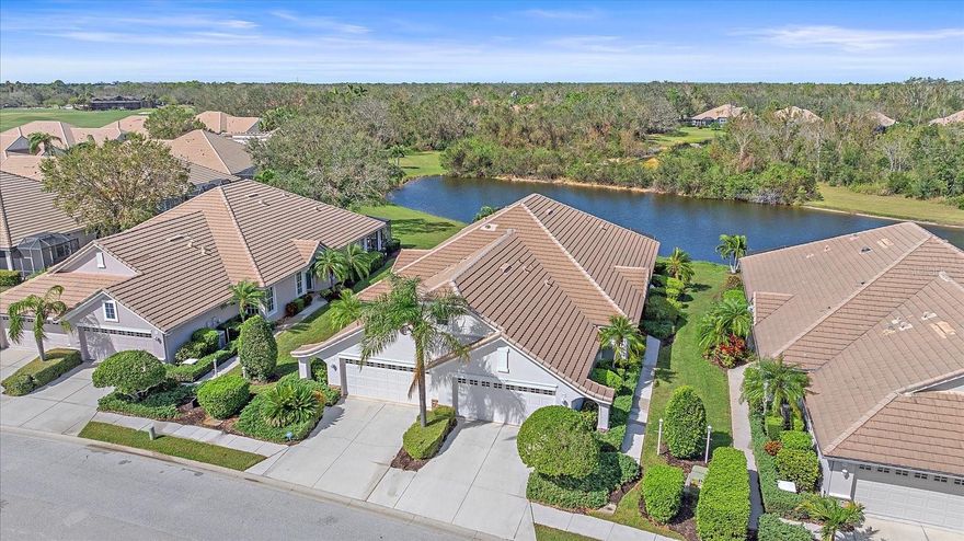 PRICE ADJUSTMENT!!!      The best value in Weston! An excellent opportunity to update and design according to your personal style. Welcome to 7011 Woodmore Terrace, a Maintenance-Free Lakewood Ranch Villa with a Private Preserve Setting. Enjoy easy Florida living. This villa is located in a quiet and welcoming neighborhood. Designed for comfort and convenience, this single-level home offers a relaxed lifestyle with spacious living areas and a functional layout perfect for everyday living. Spanning 1,565 square feet, this light-filled residence features an inviting open-concept floor plan. The kitchen has been thoughtfully updated with new granite countertops, sink, faucet, microwave, and a newer refrigerator (2019), creating a stylish and functional space at the heart of the home. Recent improvements also include a new gas water heater (2025) and re-stained bathroom tile flooring. The spacious primary suite offers a relaxing retreat with a generously sized bedroom and an en-suite bath featuring dual vanities. A versatile flex room provides the perfect option for a home office or den. The living and dining areas flow seamlessly, making gatherings both comfortable and welcoming. Step outside to your screened lanai overlooking the pond, an ideal spot for morning coffee or evening relaxation. The home is complemented by attractive landscaping, excellent curb appeal, and a 2-car garage.  One of the neighborhood’s standout features is the heated pool and spa located just steps away. This home offers a low HOA fee that covers landscape & irrigation, annual driveway, sidewalk, & roof cleaning, exterior painting as needed, cable TV, and internet. The Weston neighborhood offers an array of activities, including book clubs, Mahjong, Yoga, & Water aerobics at the community pool. While a golf membership is not included, optional memberships are available for an additional fee, offering access to four championship golf courses, 18 tennis courts, an Olympic-size pool, pickleball, a state-of-the-art fitness center, and 3 clubhouses with dining and social activities. Conveniently located minutes from Main Street shopping and dining, top-rated schools, and the world-famous Gulf Coast beaches, this villa delivers exceptional lifestyle and value. This is a rare opportunity to own in the Lakewood Ranch Country Club at the best price point available—don’t miss it.