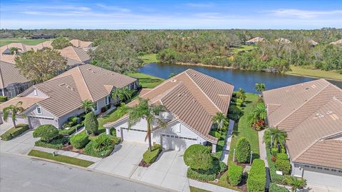 Photo of 7011 Woodmore Terrace, Lakewood Ranch, FL 34202 (MLS # A4676575)