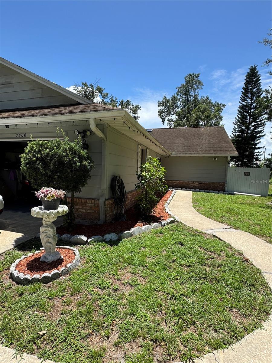 Welcome to this inviting 2-bedroom, 2-bath half-duplex nestled in one of Orlando’s most convenient locations. With a smart layout and plenty of natural light, this home offers both comfort and functionality—perfect for first-time buyers, downsizers, or investors looking for a great opportunity. Step inside to find an open living and dining area with vaulted ceilings that create a spacious, airy feel. The kitchen features ample cabinetry and a breakfast bar, making meal prep and entertaining a breeze. Both bedrooms are generously sized, with the primary suite offering a private bathroom and walk-in closet. Enjoy the Florida lifestyle in your fenced backyard, perfect for relaxing, gardening, or weekend barbecues. The covered patio extends your living space outdoors. Additional perks include indoor laundry hookups, semi private extended driveway, cul-de-sac and no neighbors in front of the property. Low HOA!