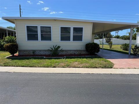 Photo of 112 Pindo Palm Street W, Largo, FL 33770 (MLS # TB8376662)