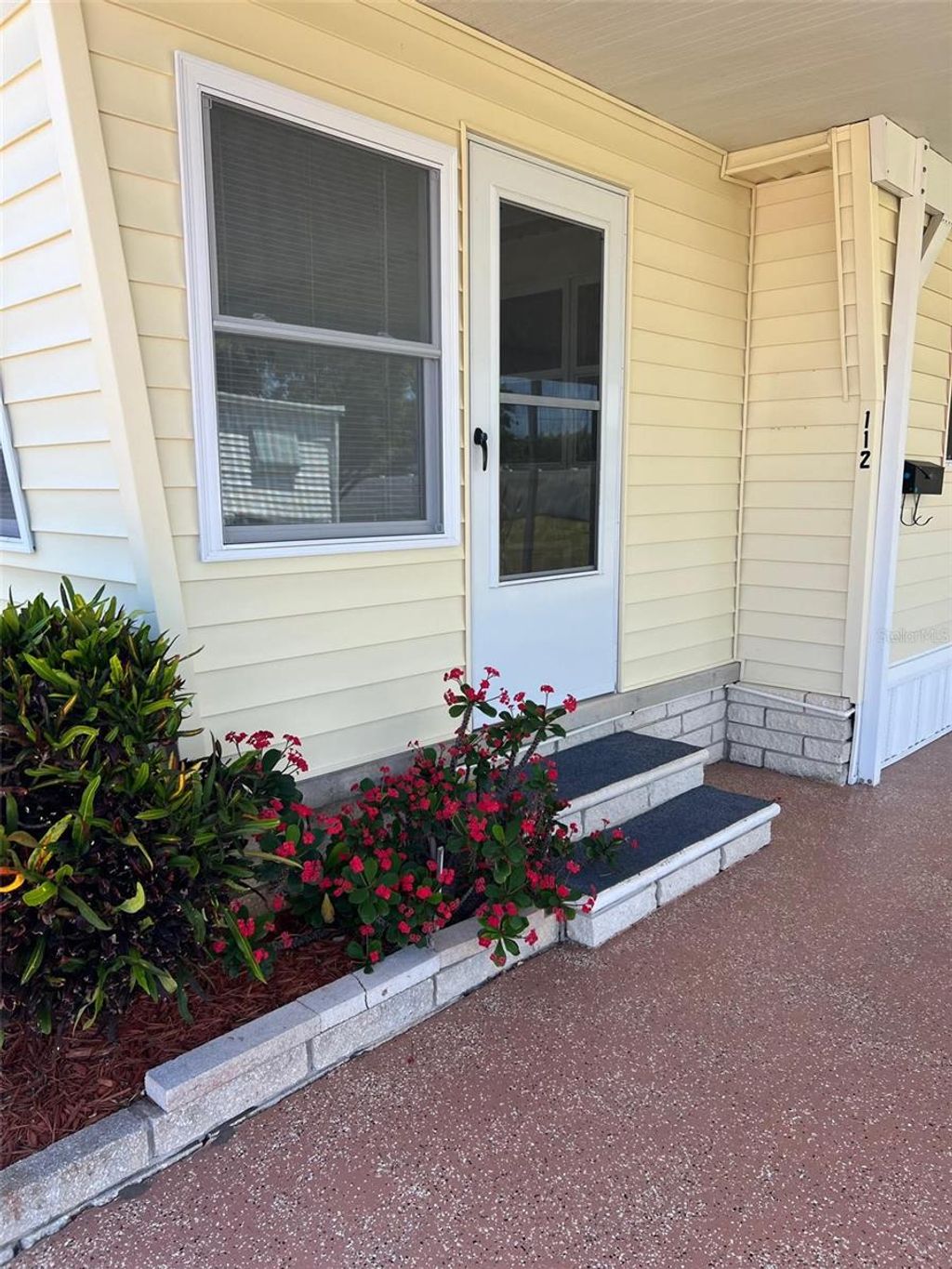 Photo of 112 Pindo Palm Street W, Largo, FL 33770 (MLS # TB8376662)