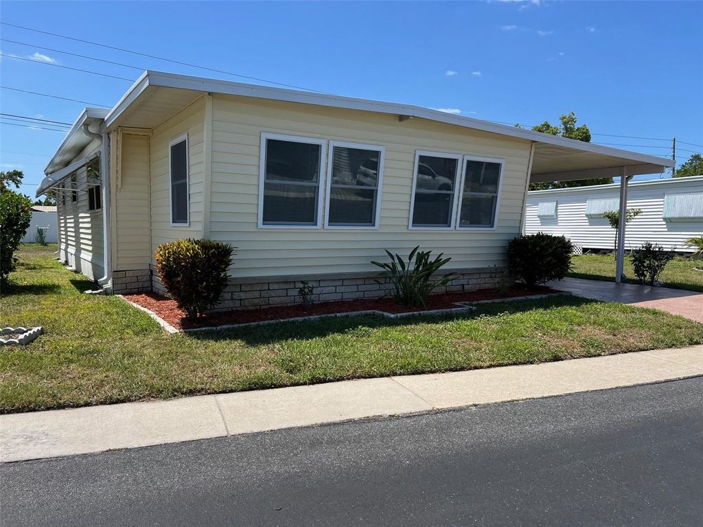 Photo of 112 Pindo Palm Street W, Largo, FL 33770 (MLS # TB8376662)