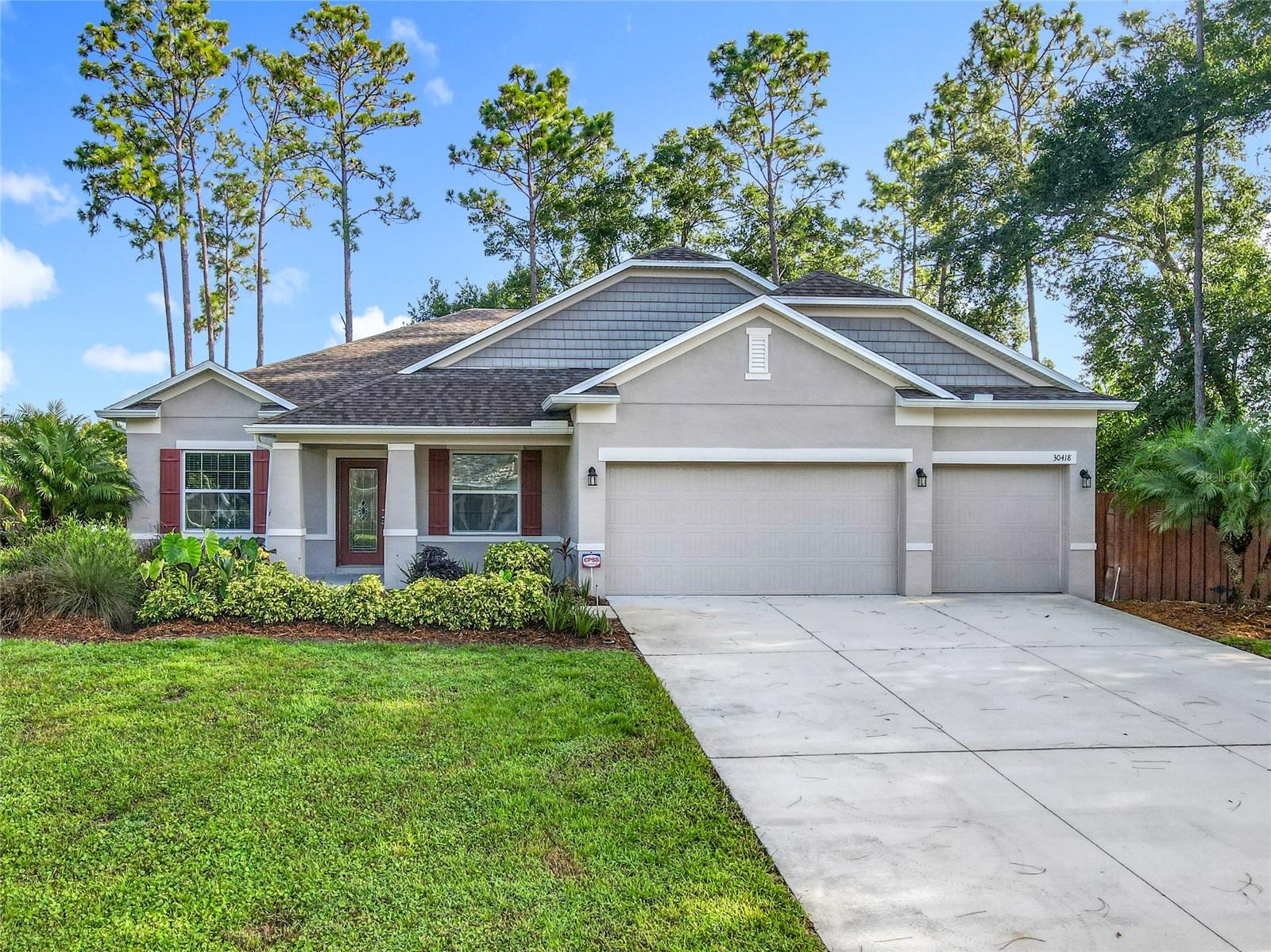 Welcome to this beautifully maintained 4-bedroom, 3-bath home situated on a spacious half-acre corner lot in the desirable community of Plymouth Creek Estates in Sorrento. Offering 2,438 square feet of well-designed living space, this home features an expansive Triple-Split Open Floor Plan with elegant crown molding, tray ceilings, double-insulated windows to name a few upgrades. The kitchen is appointed with granite countertops, stainless steel appliances, double ovens, and ample space perfect for both everyday living and entertaining. A flexible bonus room with glass French doors offers an ideal space for a home office, study, or media room.
Freshly painted inside and out, the home also includes an upgraded well, a whole-house water filtration system, and gutters with a leaf guard system for low-maintenance care. The fully fenced backyard is beautifully landscaped and provides plenty of outdoor space to relax or entertain, including a screened-in porch that extends your living area. The spacious primary suite serves as a peaceful retreat, featuring a massive walk-in closet and a luxurious en suite bath with an oversized shower, dual vanities, and an abundance of cabinet and storage space—offering comfort and function in equal measure.
Located in the peaceful, well-kept neighborhood of Plymouth Creek Estates, this home offers a quiet setting with convenient access to SR 46, the 429/Wekiva Parkway, Mount Dora, Sanford, and Orlando. Outdoor enthusiasts will love being close to Wekiwa Springs State Park, Rock Springs Run, and several local golf courses. With a split-bedroom layout, three full bathrooms, and flexible living areas, this home is also well-suited for multigenerational living. Don’t miss your opportunity to own this exceptional property—schedule your private showing today.