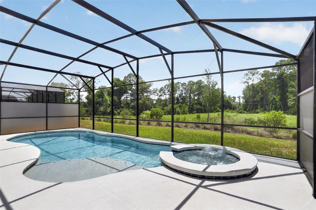 Photo of 1242 Butterfly Orchid Road, Davenport, FL 33837 (MLS # O6421680)